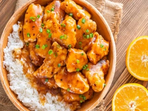 خوراک مرغ پرتقالی با طعم آسیای شرقی در تابه چدنی